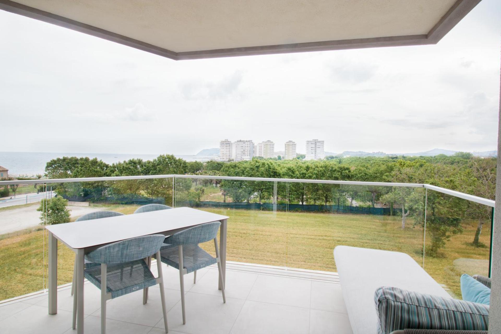 Deluxe Apartment with Terrace and Side Sea View