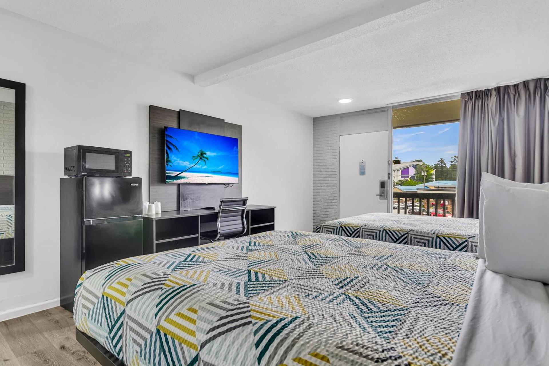 Camera con 2 Letti Queen-Size e Accesso e Doccia per Ospiti Disabili