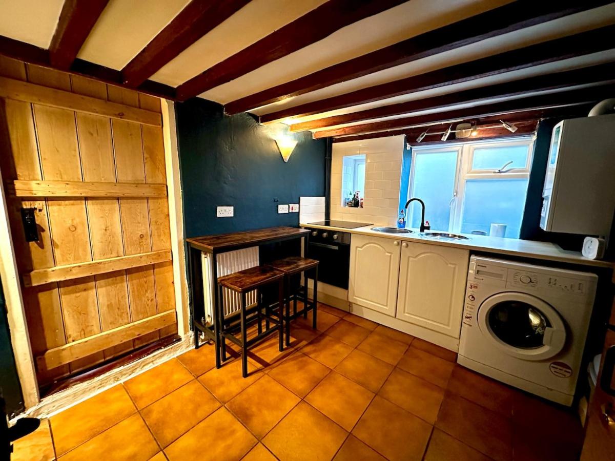 Rustic 18th century stone cottage with fireplace and parking