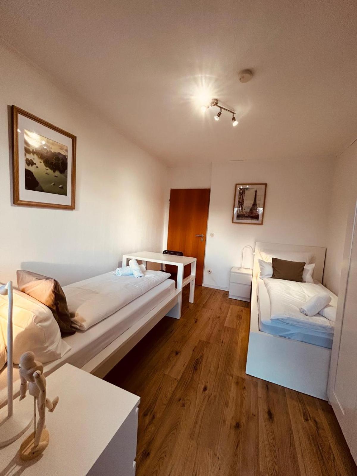 Osnabrücker Strasse Wooon 10 Einzelbetten I 5-Zimmer I TV I Bad NEU I Premiumbettwäsche