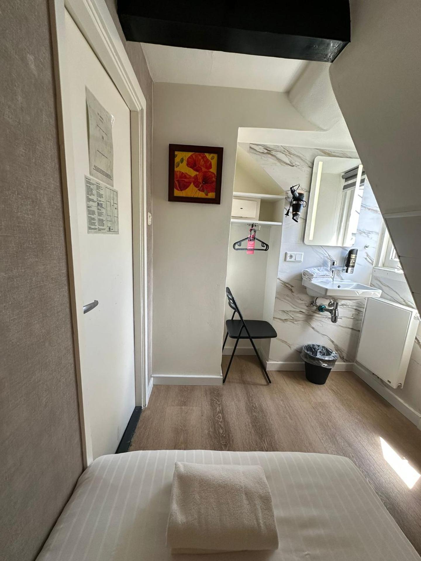 Basic Single Room with Shared Bathroom -