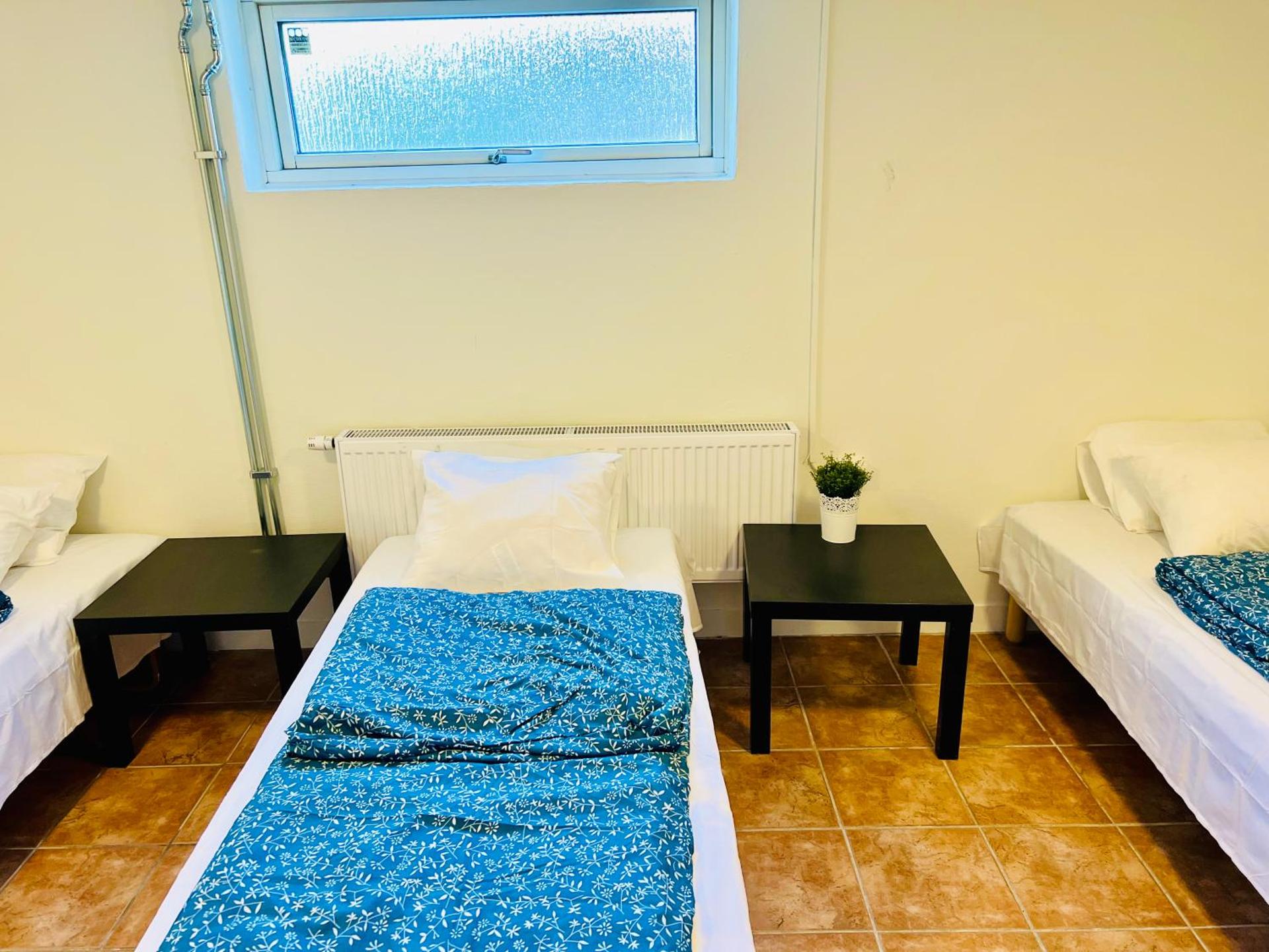 Cozy room with 3 single bed in Landskrona
