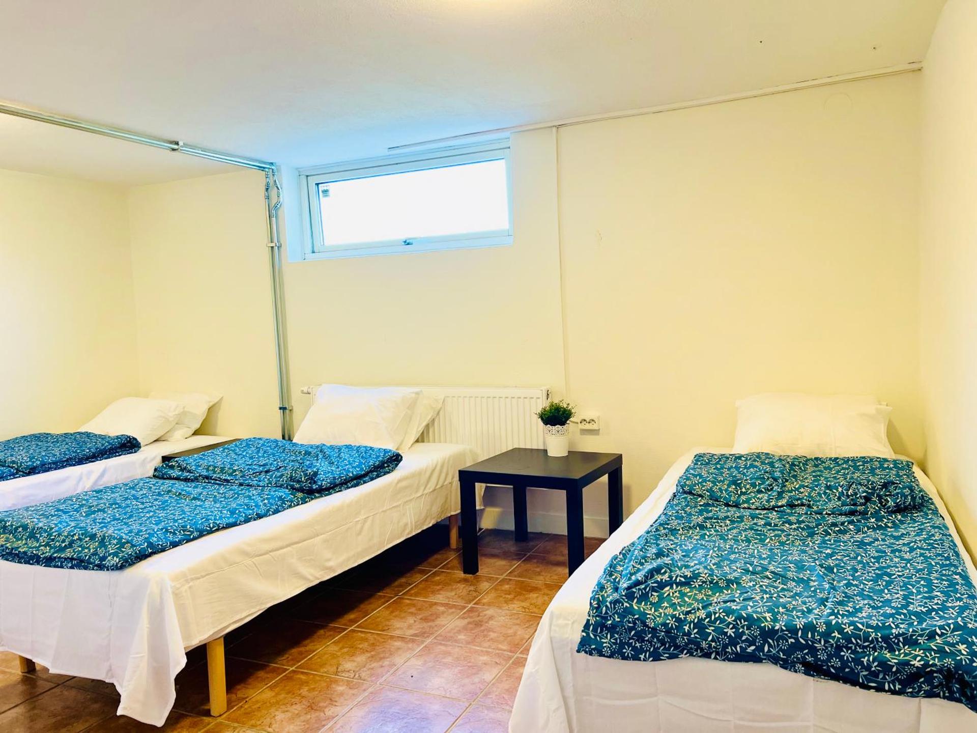 Cozy room with 3 single bed in Landskrona