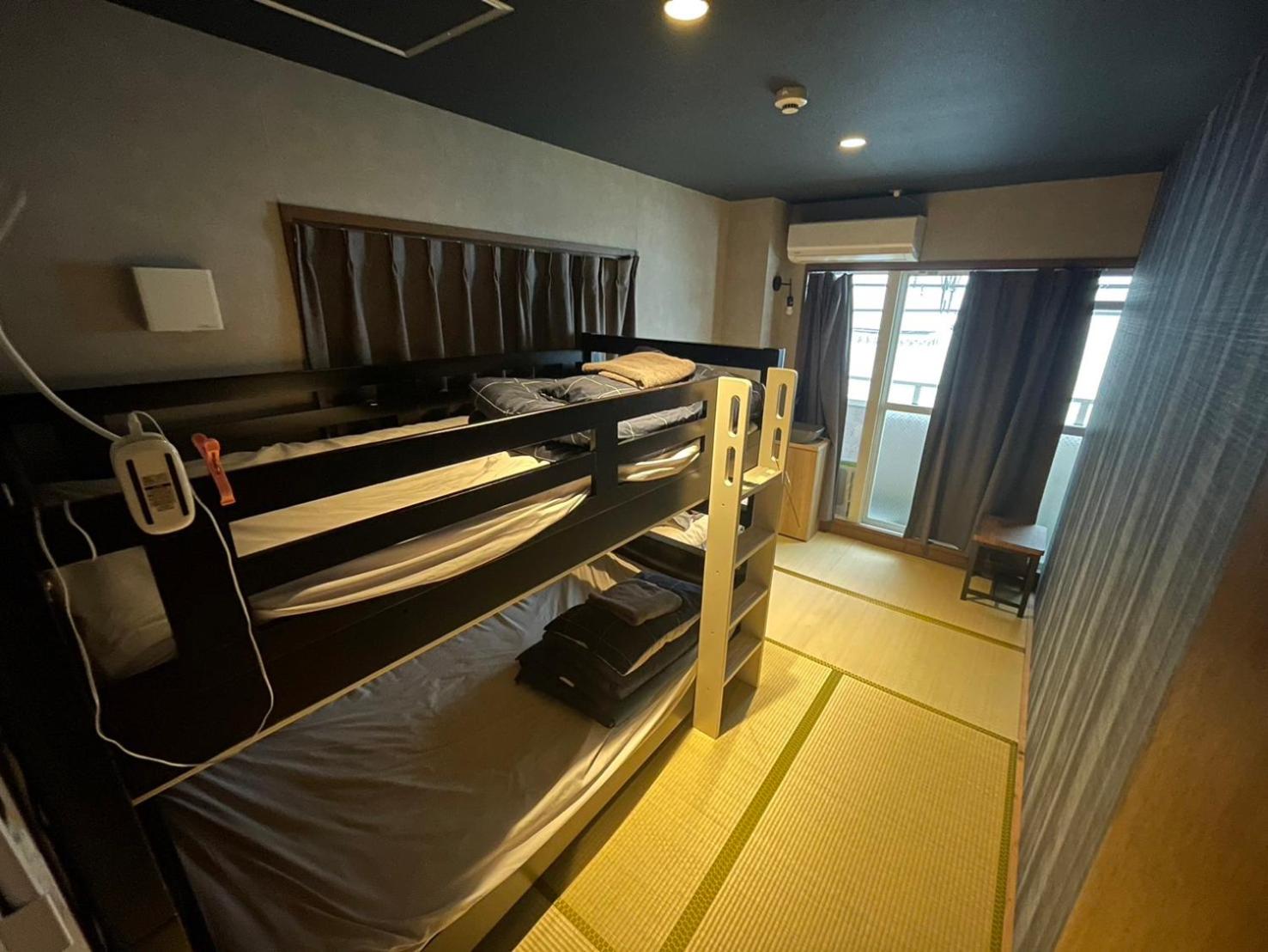 Camera Tripla con Servizi Igienici in Comune