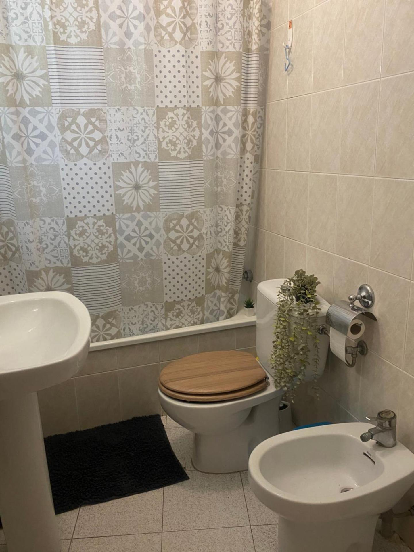 Habitación con baño compartido