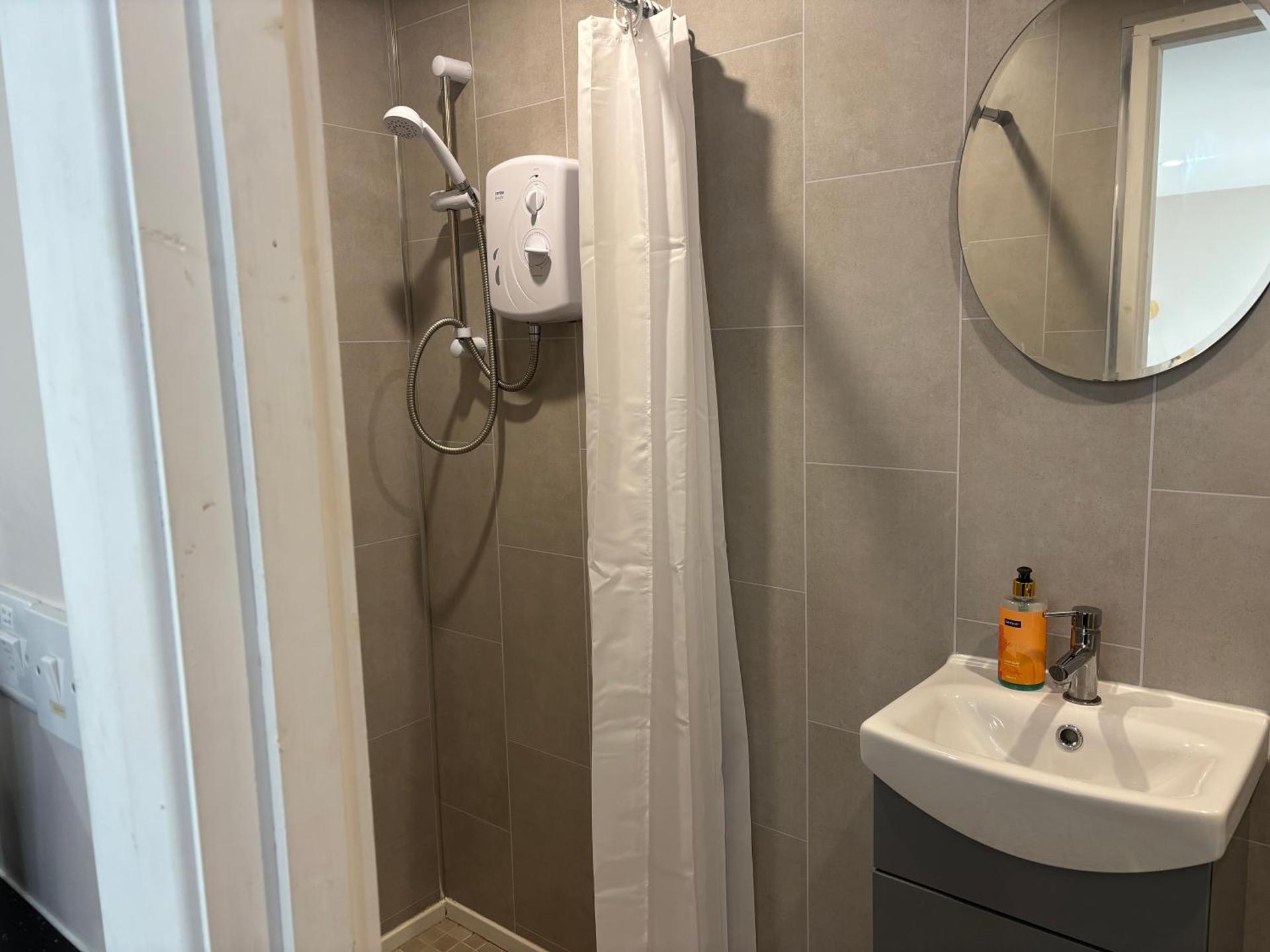 Private Detached Small Bedroom and Bathroom Only- This is not an apartment- No clothes storage- no cooking facilities