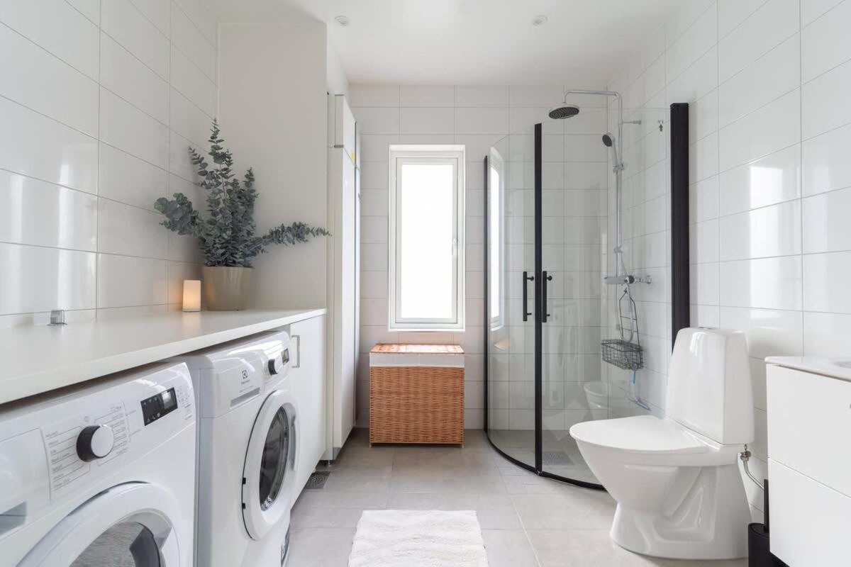 Earthy Ground Floor Home with Patio Sunbeds Greenery