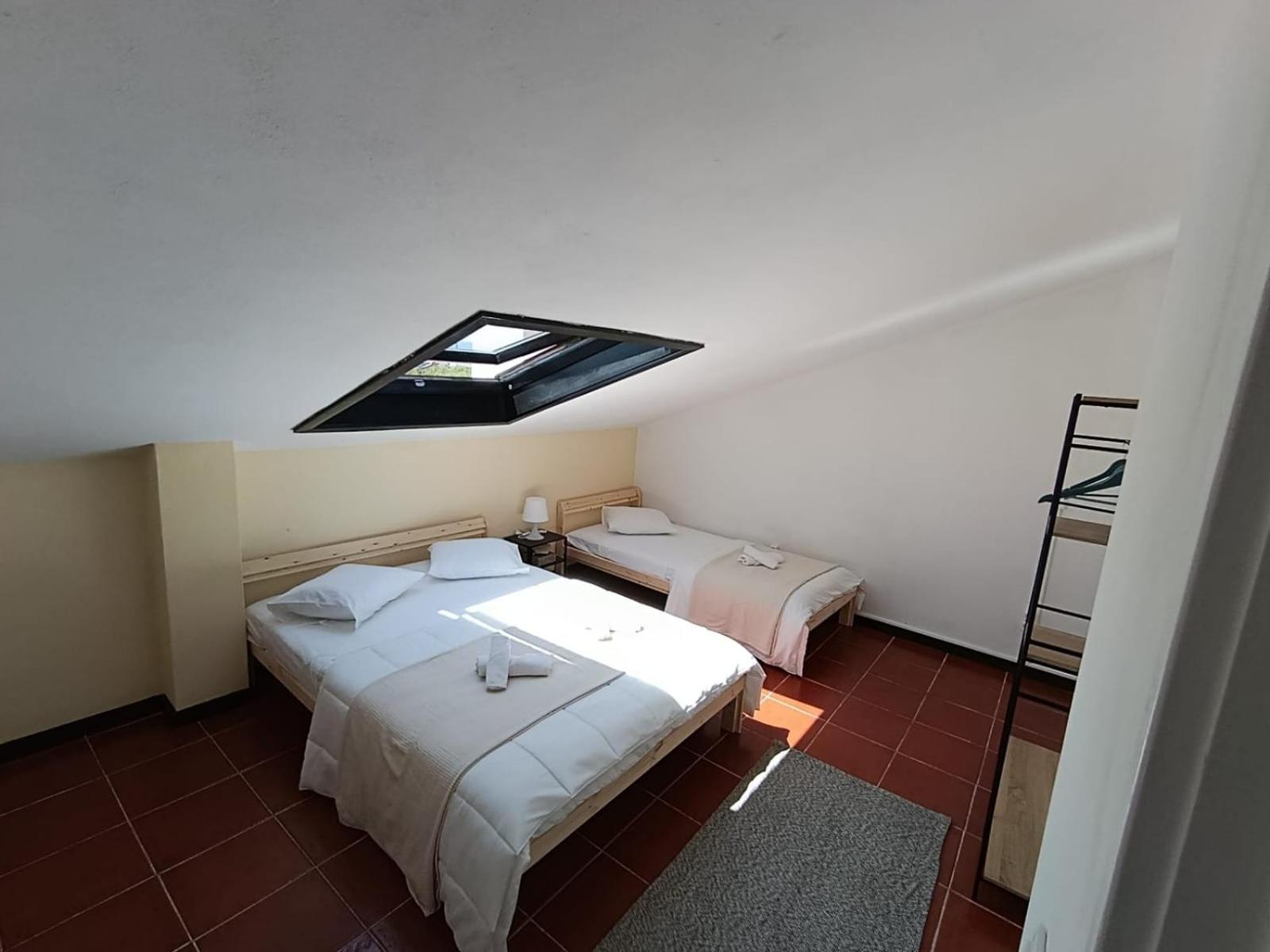 Camera Tripla Basic con Bagno in Comune