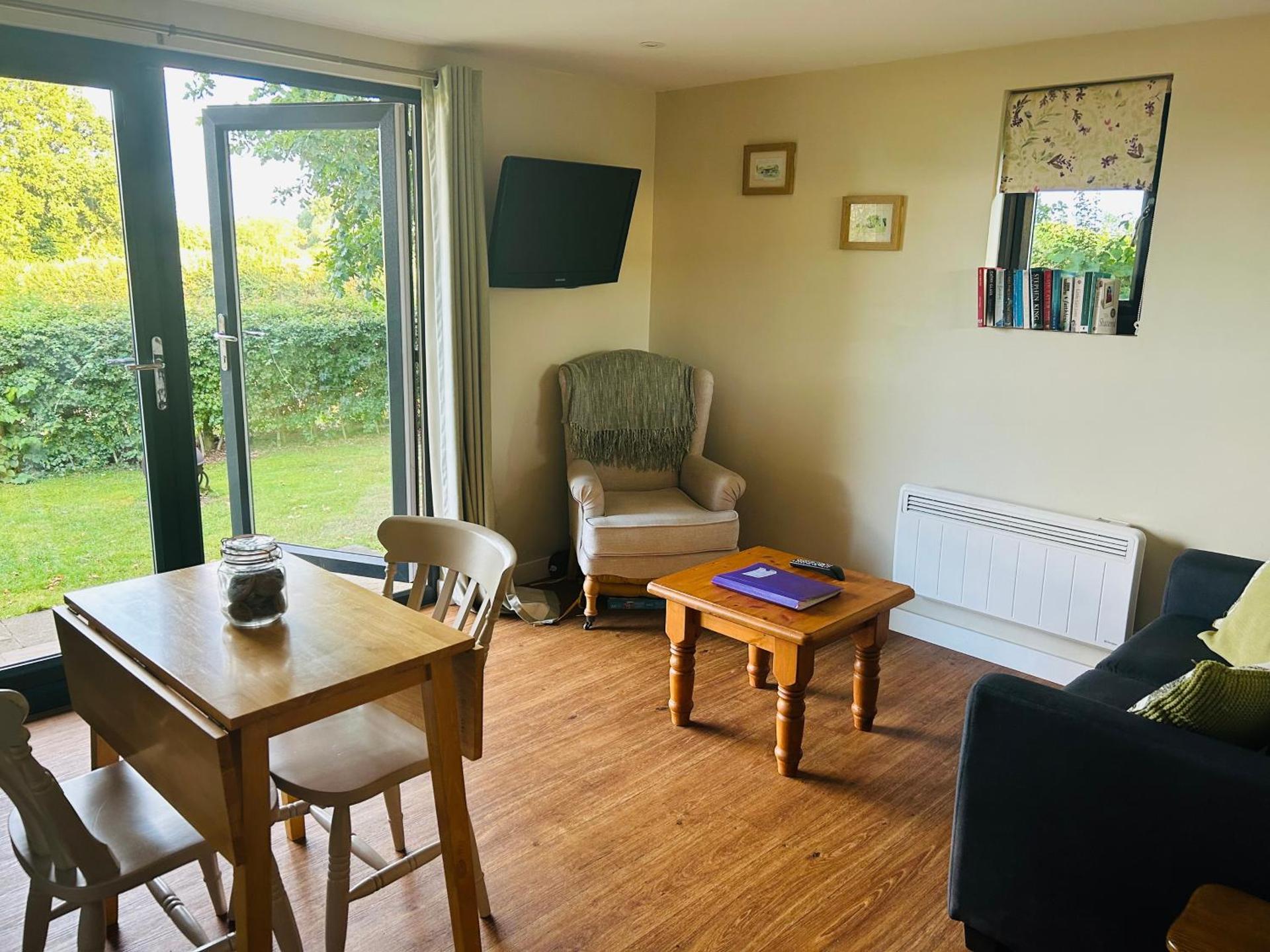 Secluded Log Cabin in beautiful private gardens