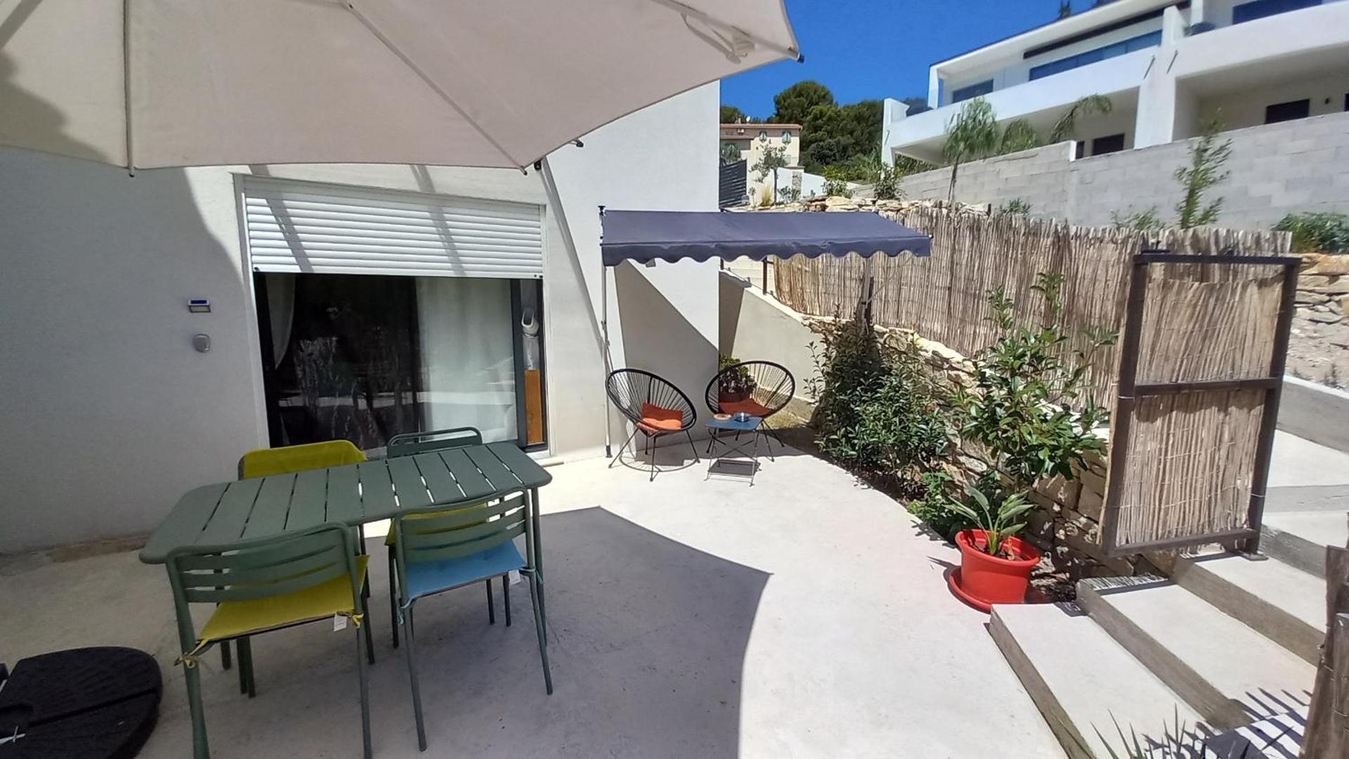 Appartement avec terrasse dans maison individuelle