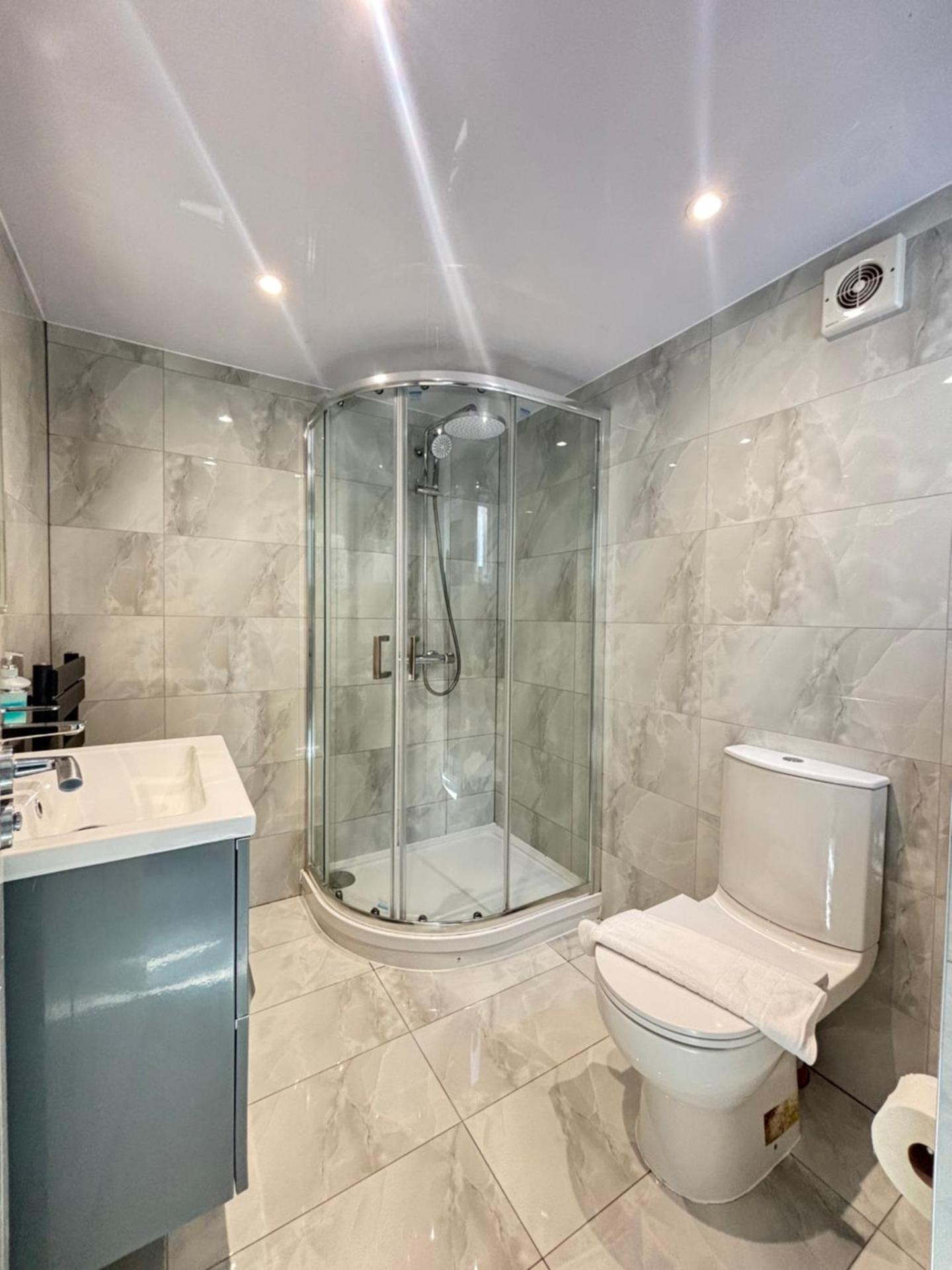 CozyNest 2BR Modern Property with Parking