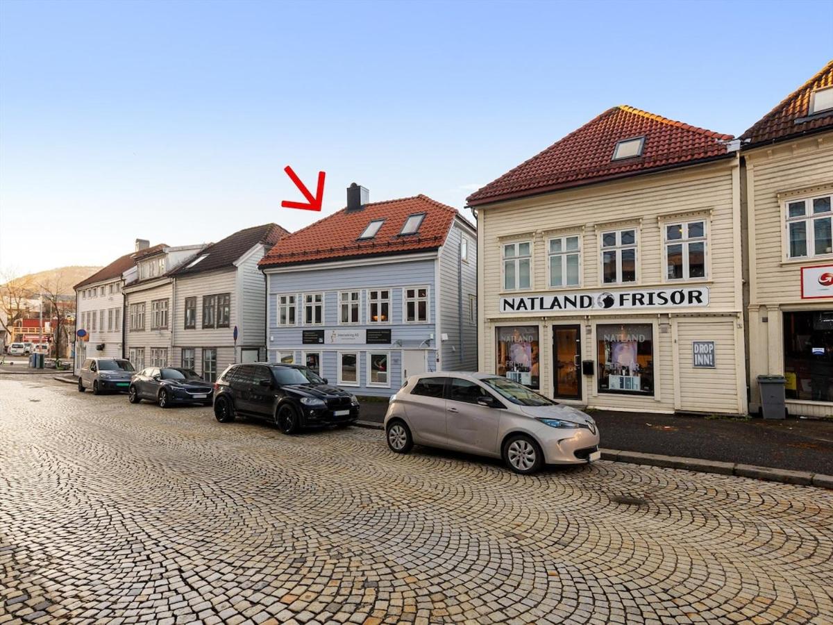 In the middle of Bergen City in a real Bergenshus from the 18th Century