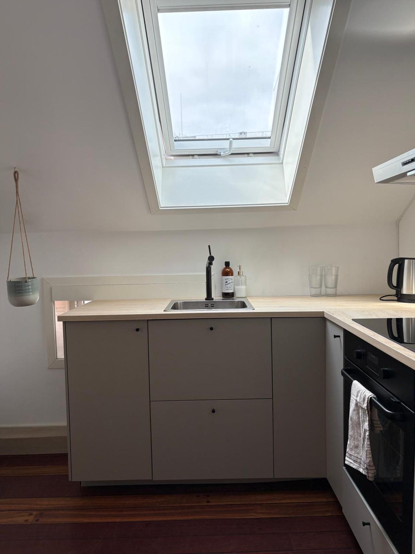 In the middle of Bergen City in a real Bergenshus from the 18th Century