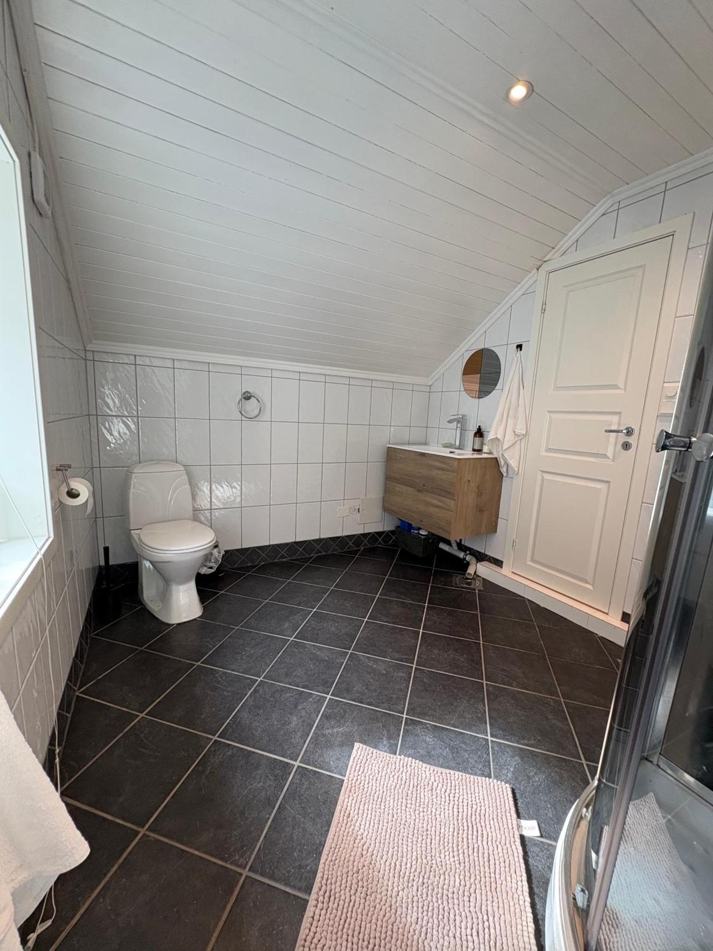 In the middle of Bergen City in a real Bergenshus from the 18th Century