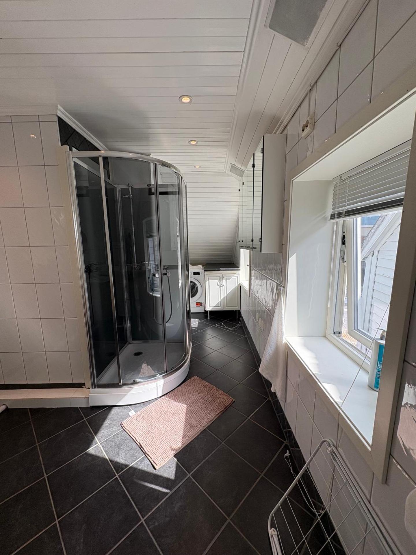 In the middle of Bergen City in a real Bergenshus from the 18th Century