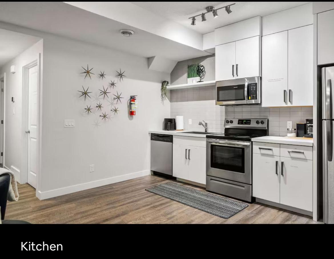 Brand new suite with parking pad at the back