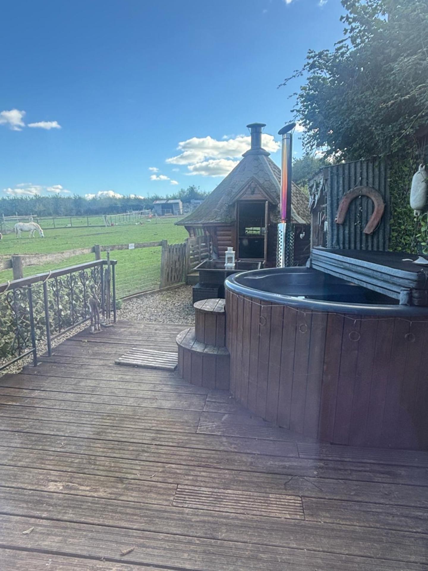 Bridie -rose with wood tub country retreat