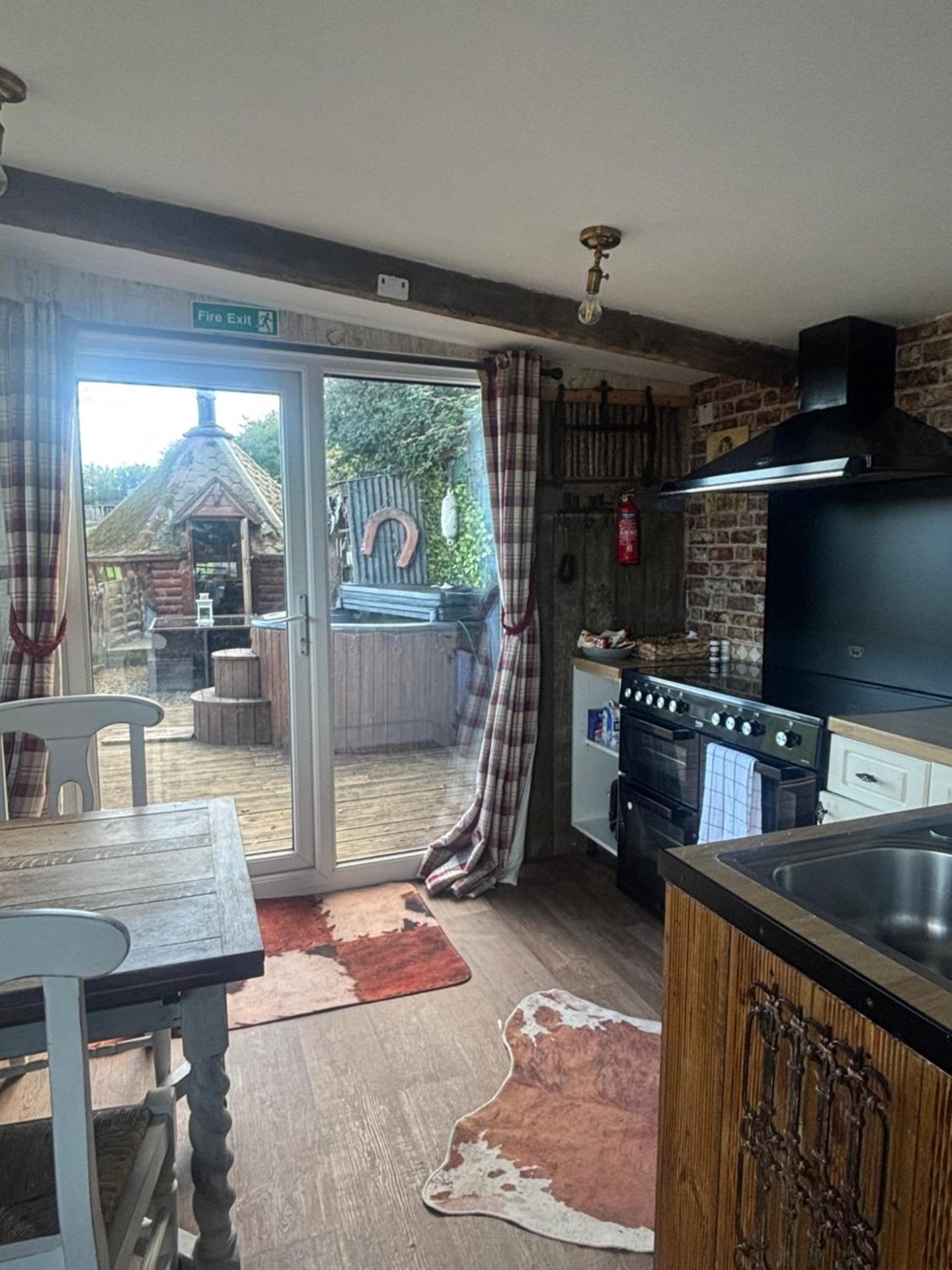 Bridie -rose with wood tub country retreat