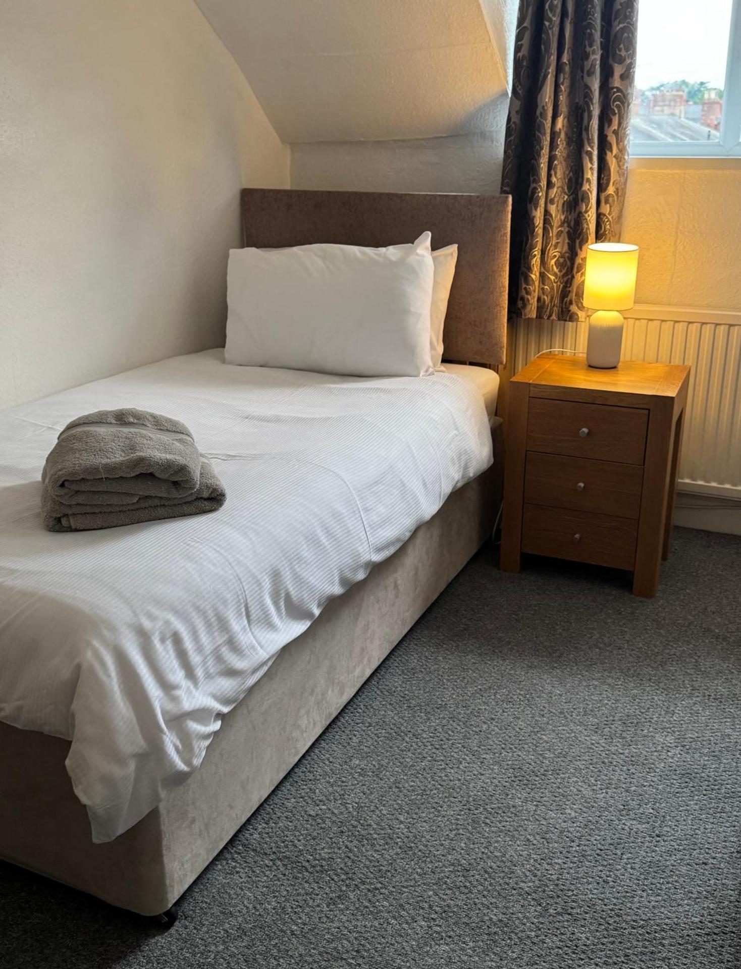 Single Room with Shared Bathroom