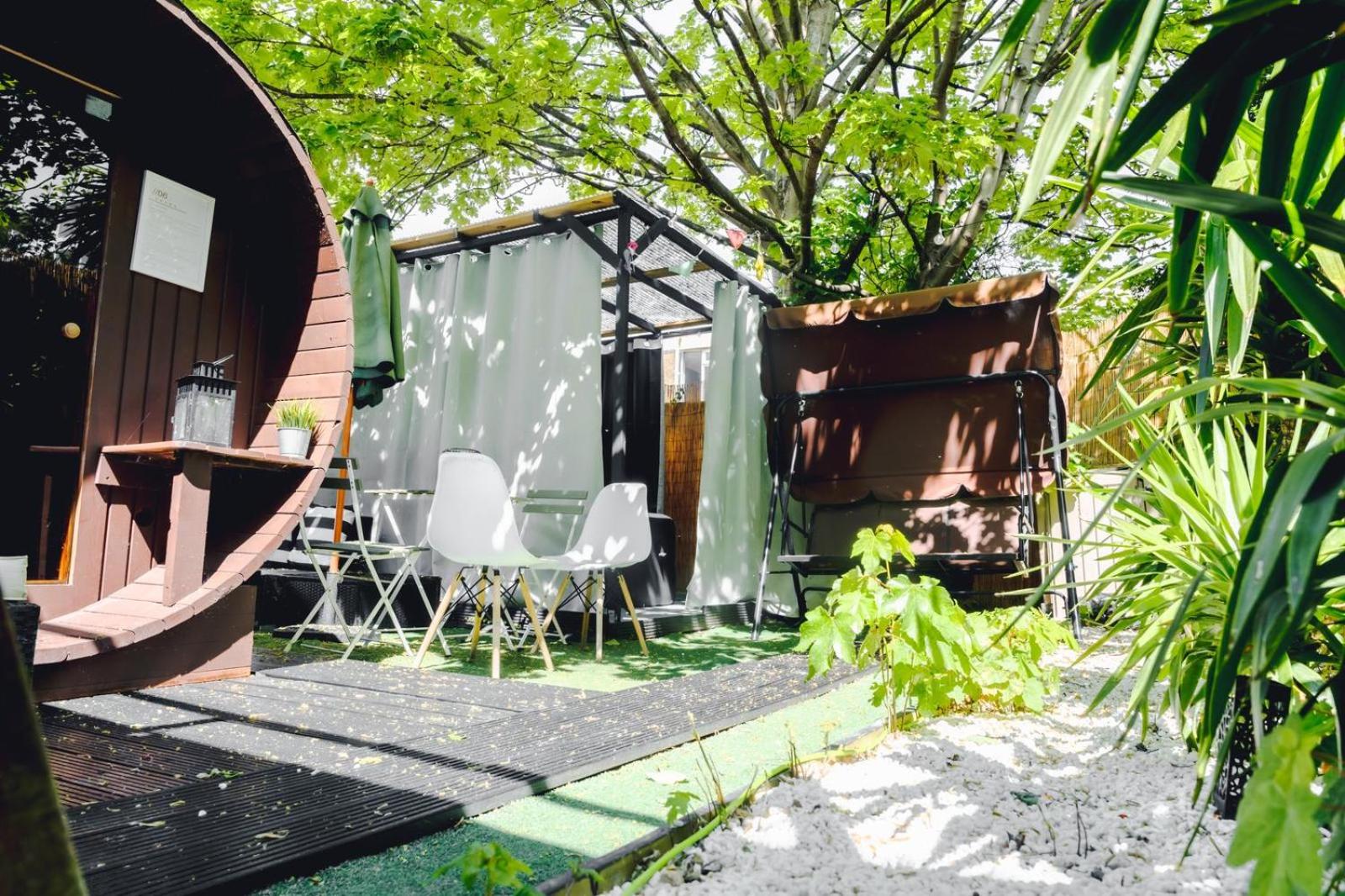 TranquilHaus! 3BR Retreat with Spa Saunas, Hot Tub & Garden Cinema