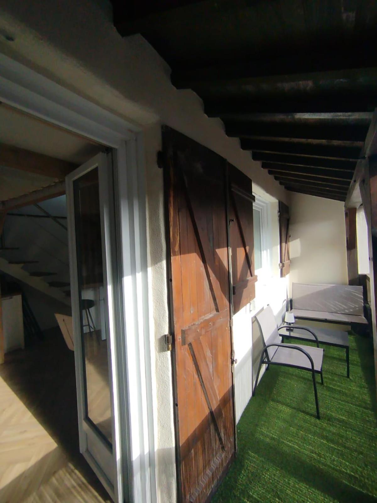 Le Perchoir de Linas, filet suspendu, appartement cosy