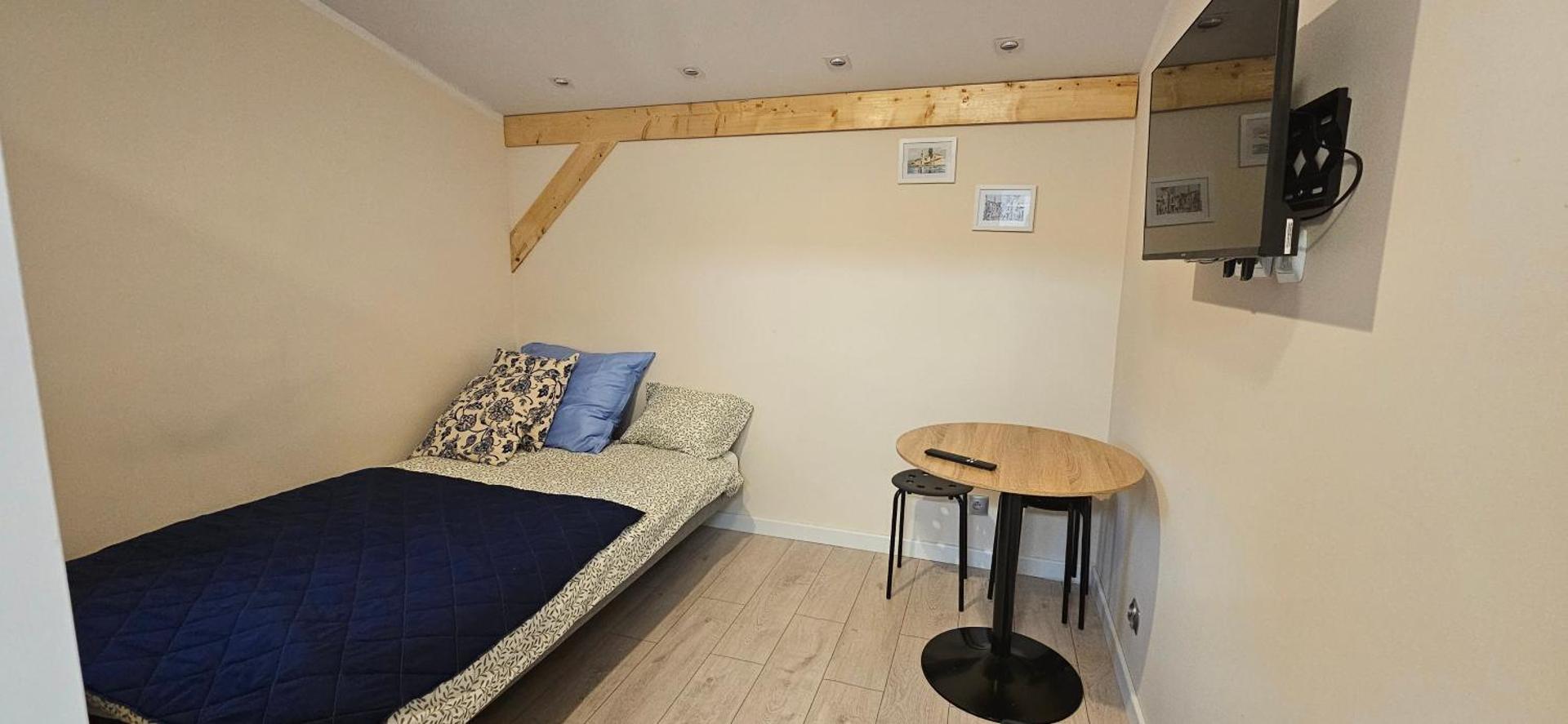 Przytulny pokój w Mazurska Ostoja ze wspólną łazienką i kuchnią