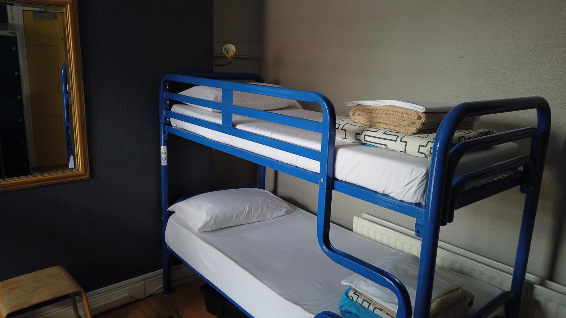 Bed in 6-Bed Female Dormitory Room with Shared Bathrooms