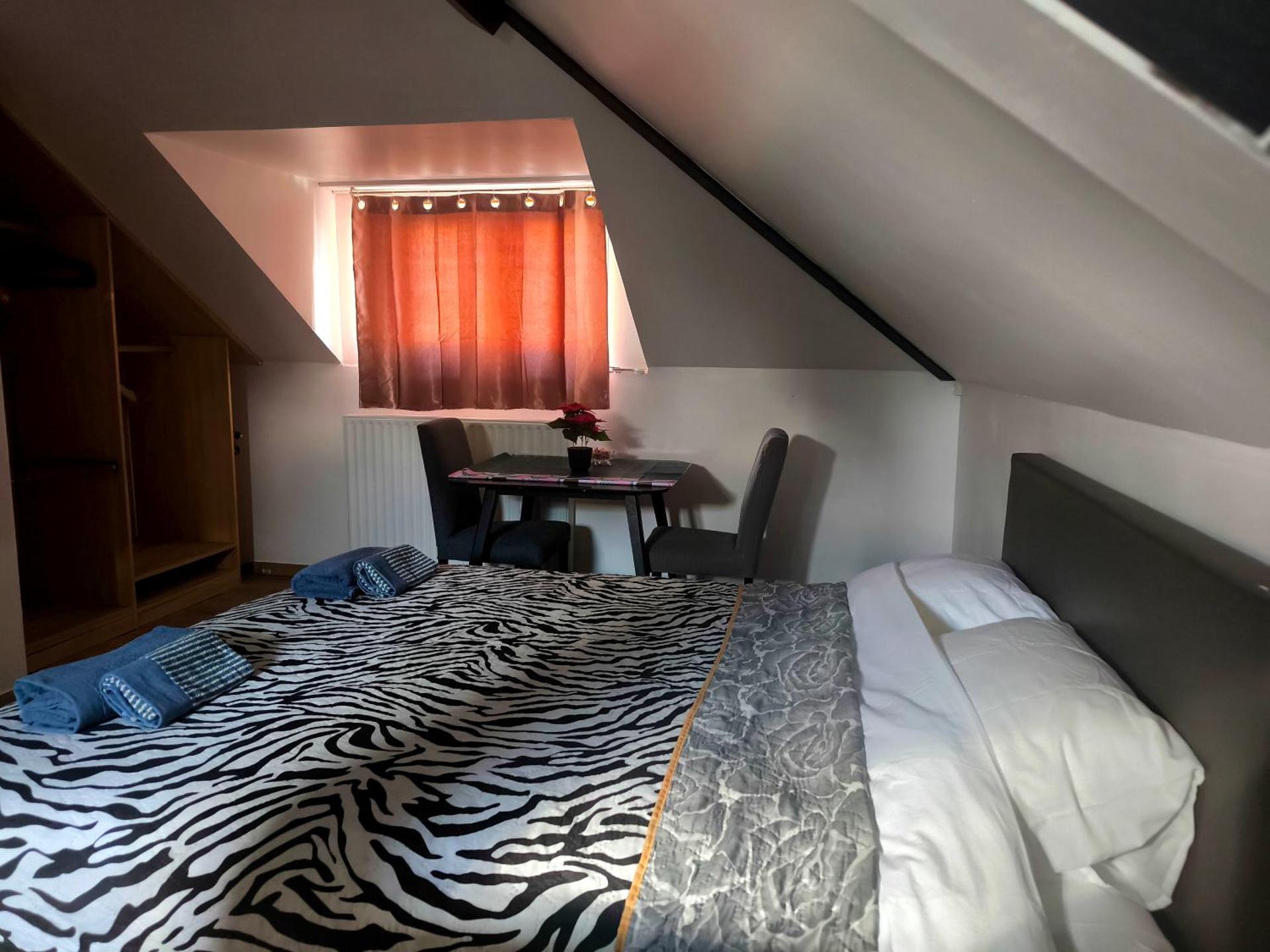 Room near the center with bathroom and kitchen