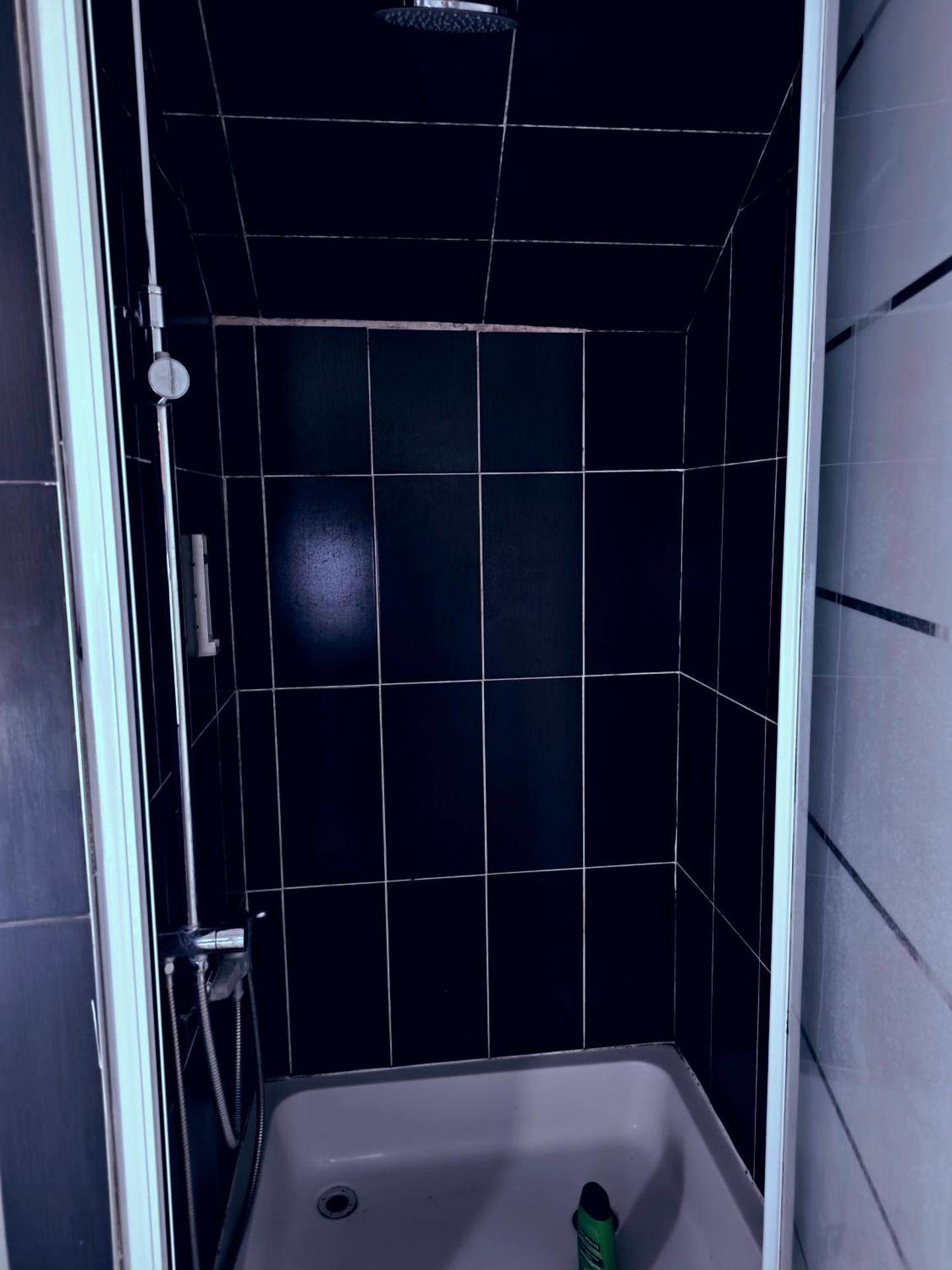 Room near the center with bathroom and kitchen