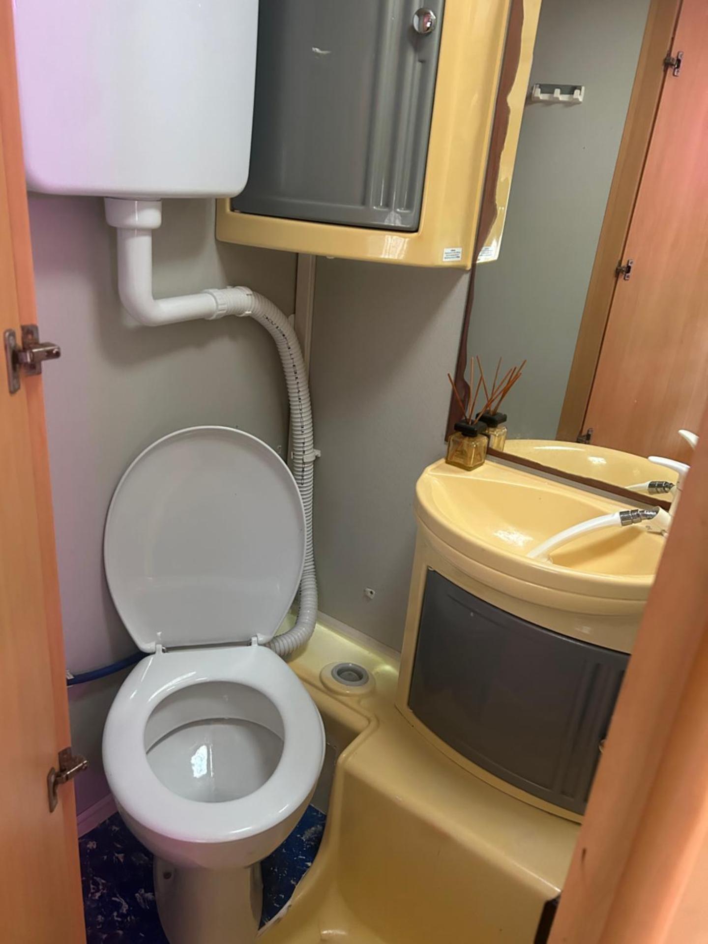 Large camper in the olive grove