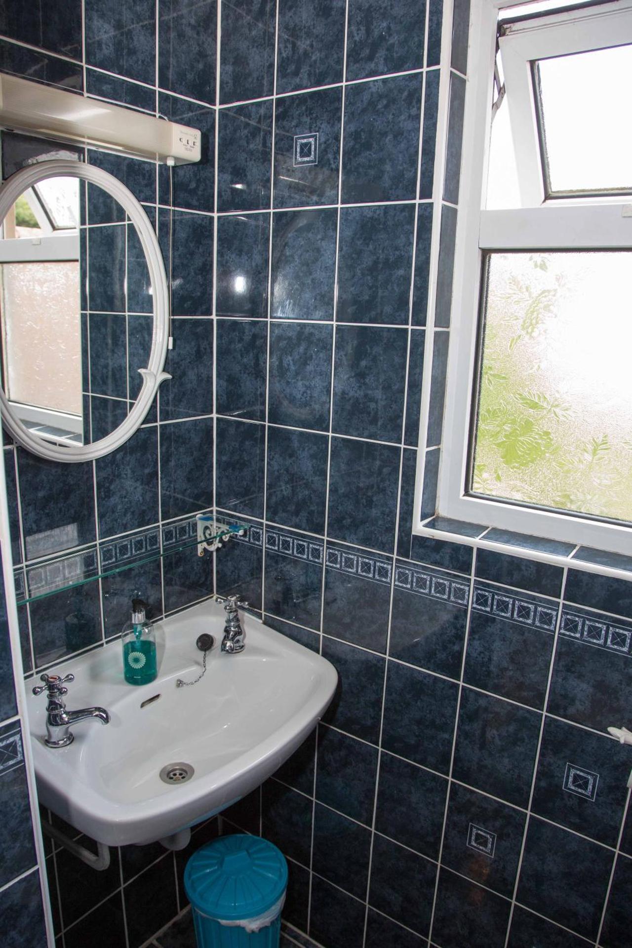 Quadruple Room with Private Bathroom