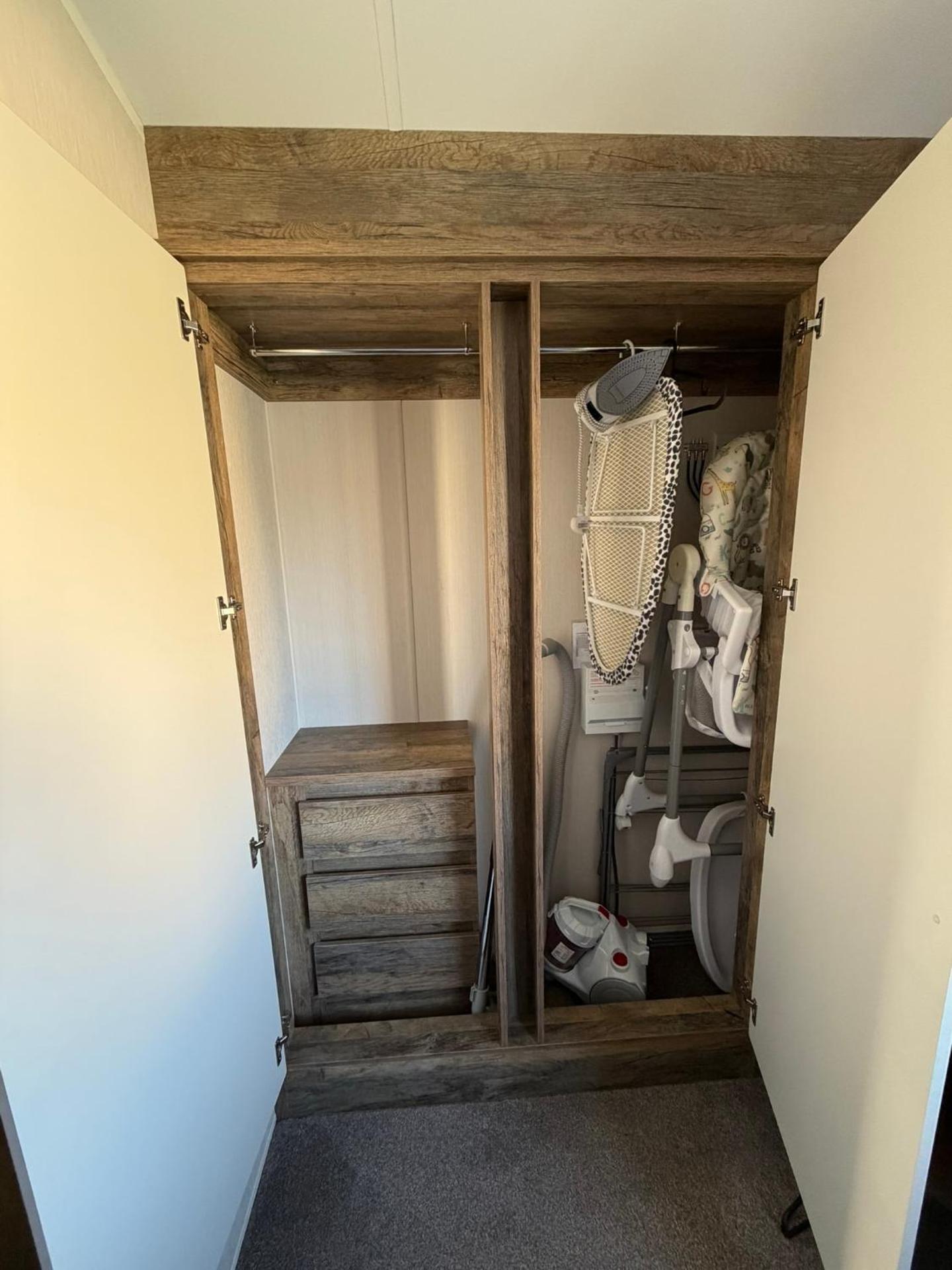 Luxury mini lodge with hot tub and decking at Tattershall Lakes