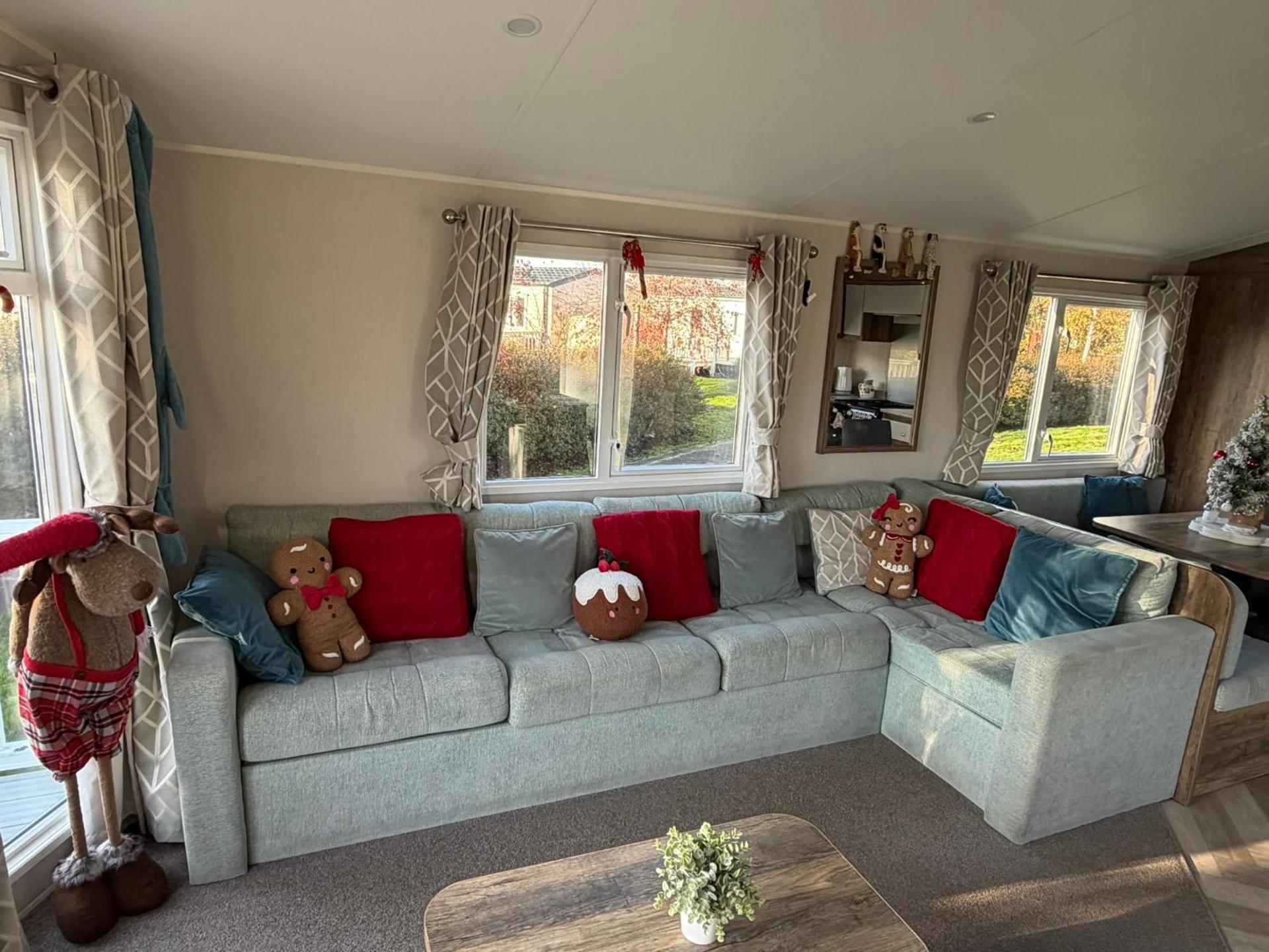 Luxury mini lodge with hot tub and decking at Tattershall Lakes