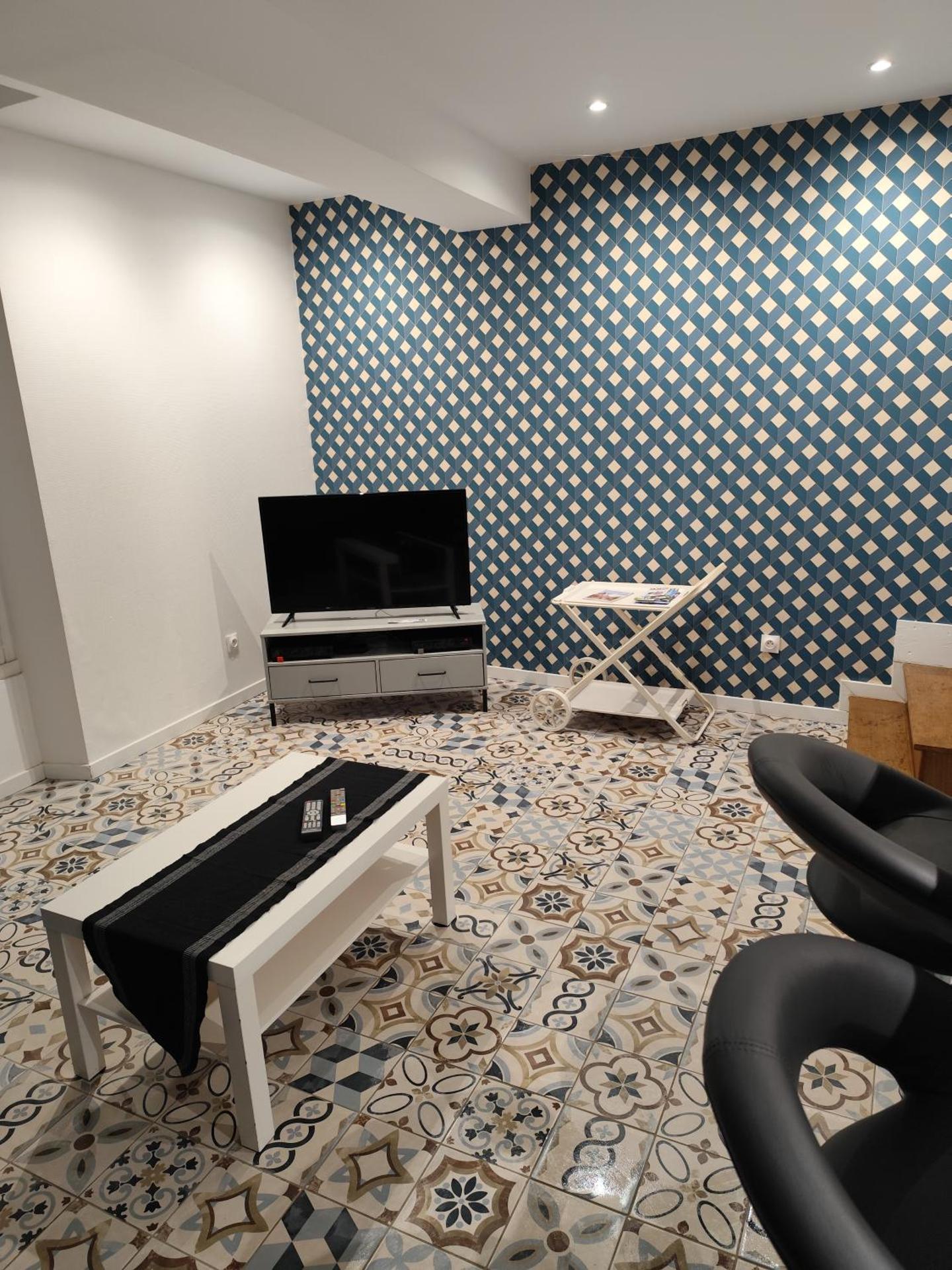 Maison au pied du château