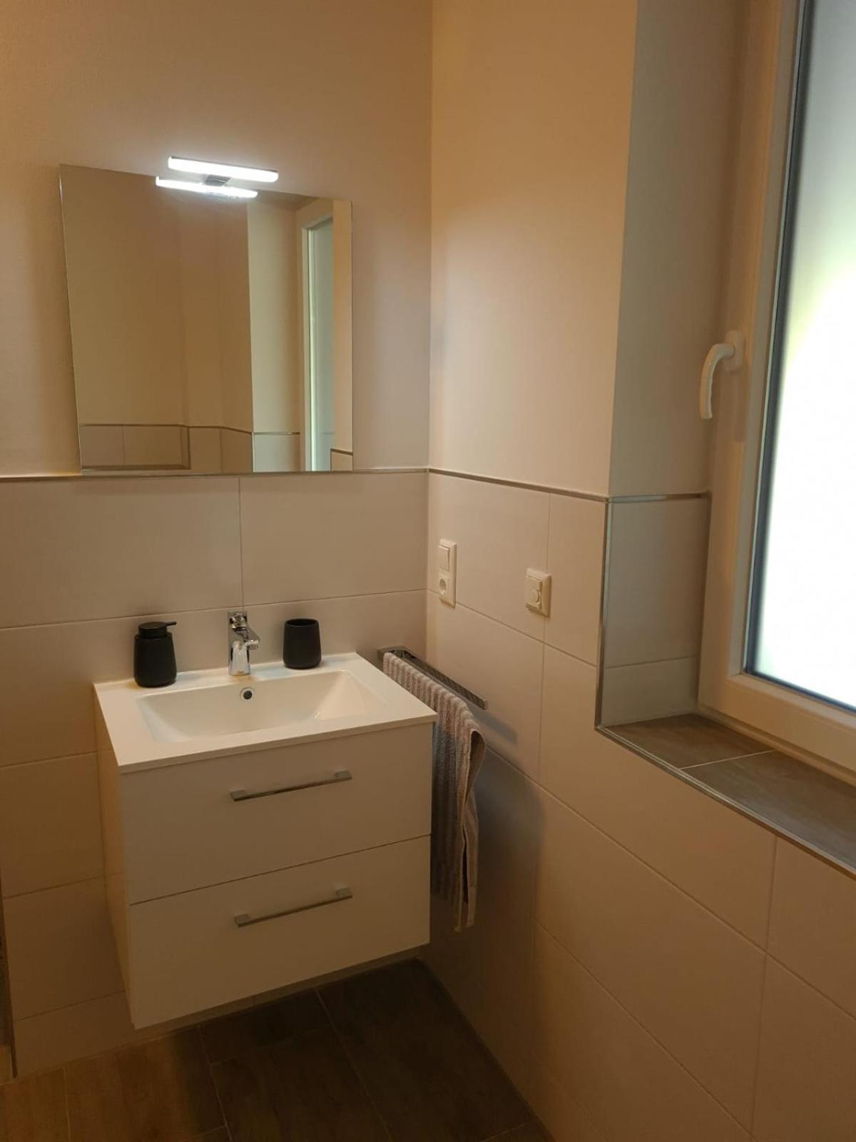 Haus KüstenBrise - Urlaub mit Hund an der Küste mit eigenen Garten, Sauna und gemütlichen Kaminfeuer