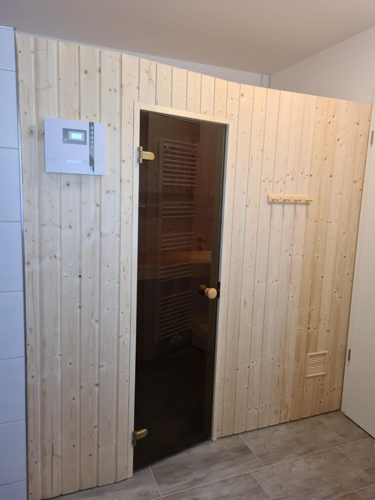 Haus KüstenBrise - Urlaub mit Hund an der Küste mit eigenen Garten, Sauna und gemütlichen Kaminfeuer