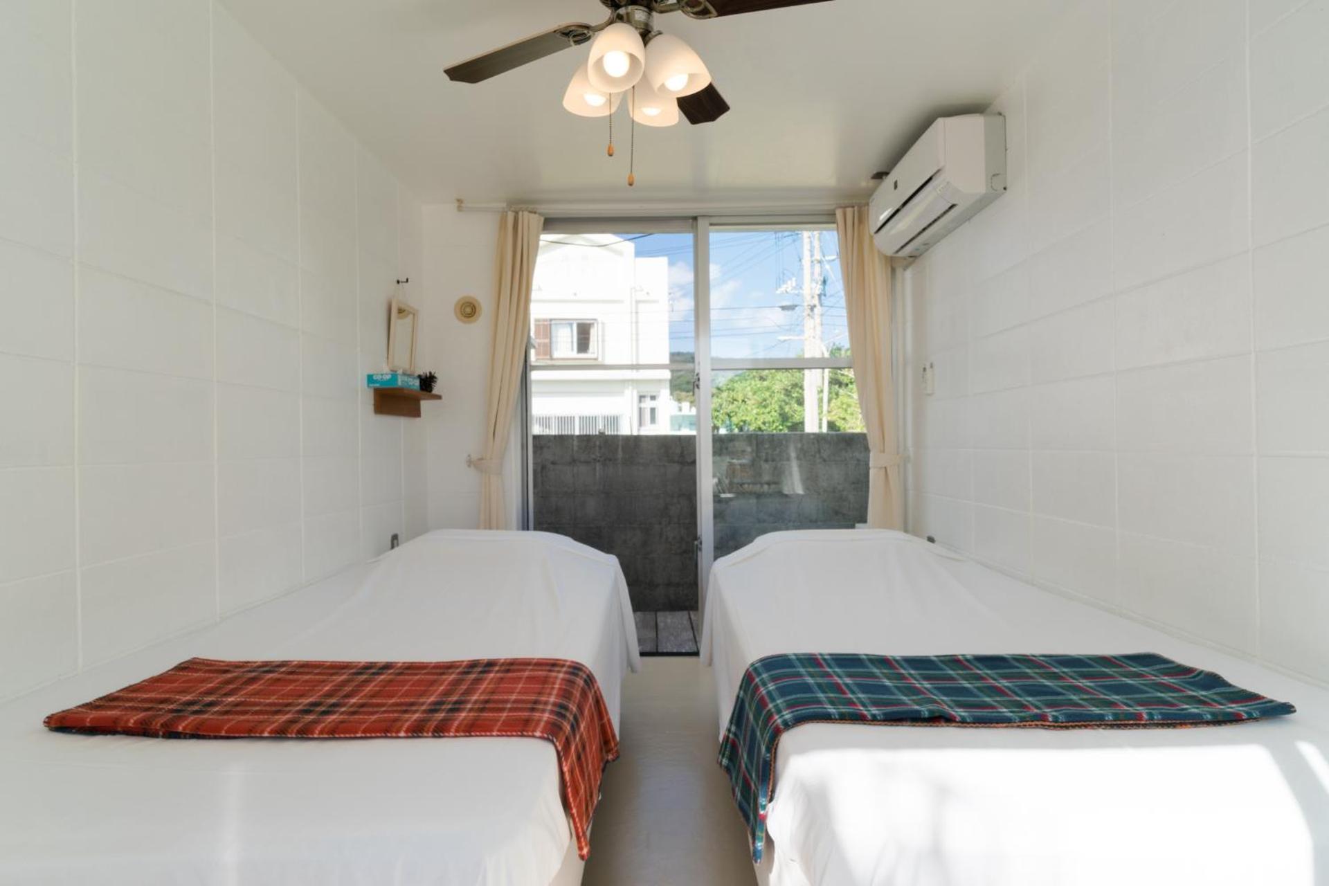 Camera Doppia con Letti Singoli