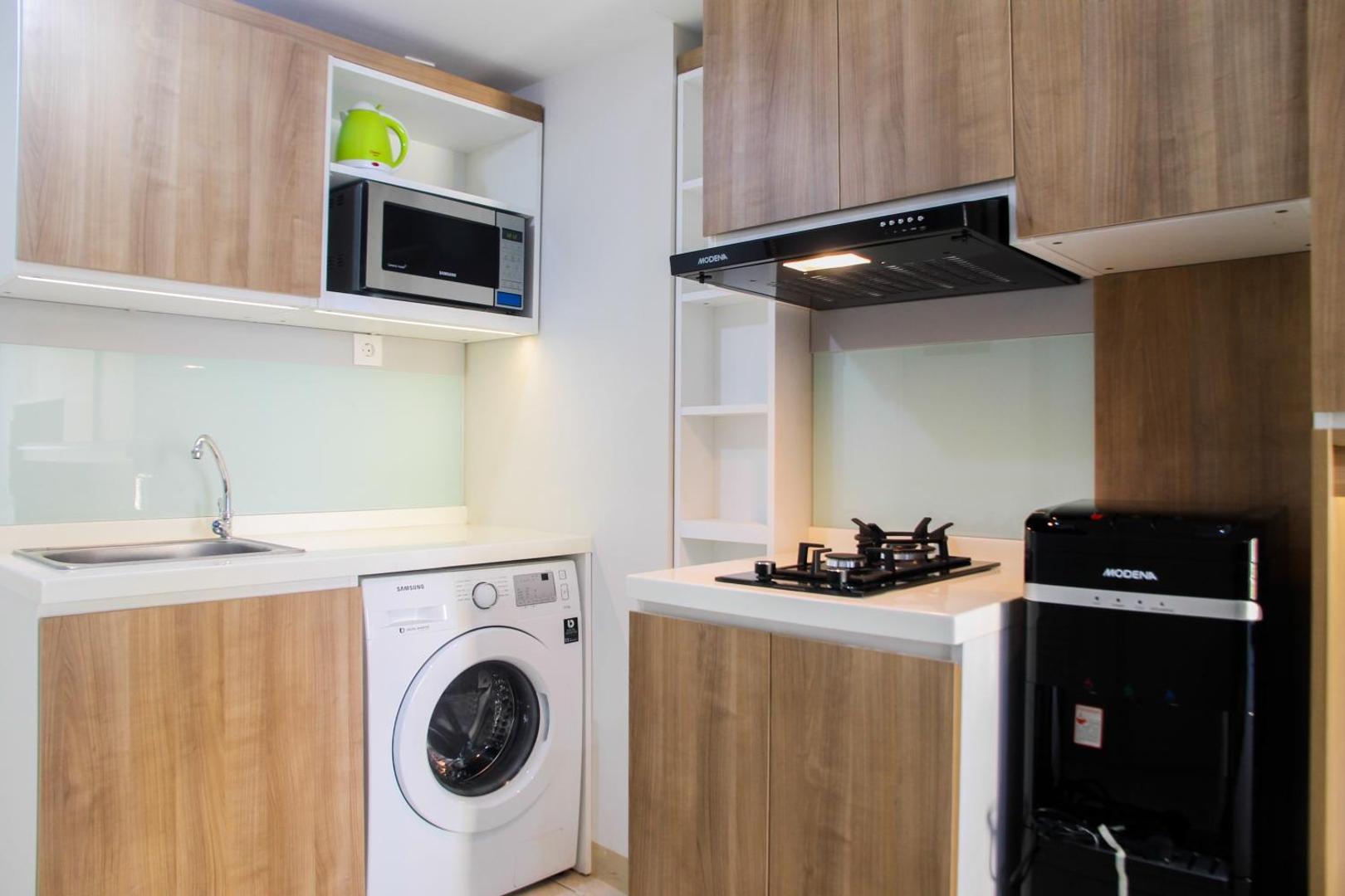 Foto 4: 2BR with Sofa Bed at Springlake Summarecon Apartment By Travelio