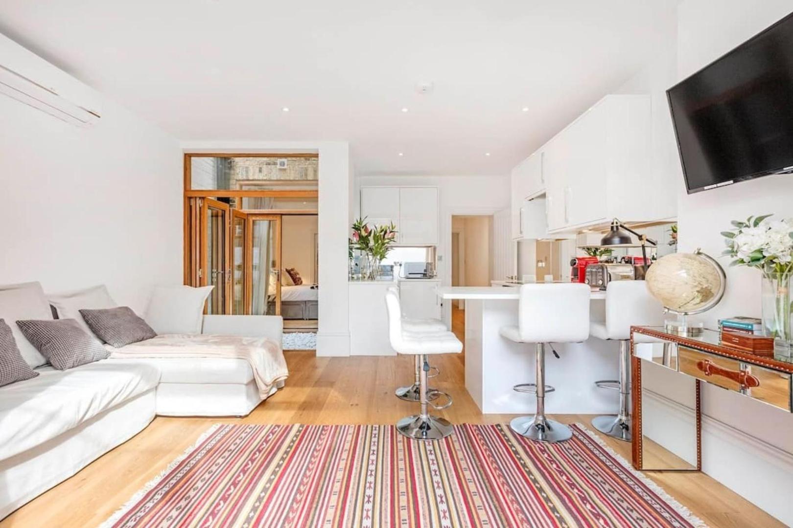 Foto 6: Fulham Broadway 2-Bed Apt w Garden & Pets Ok