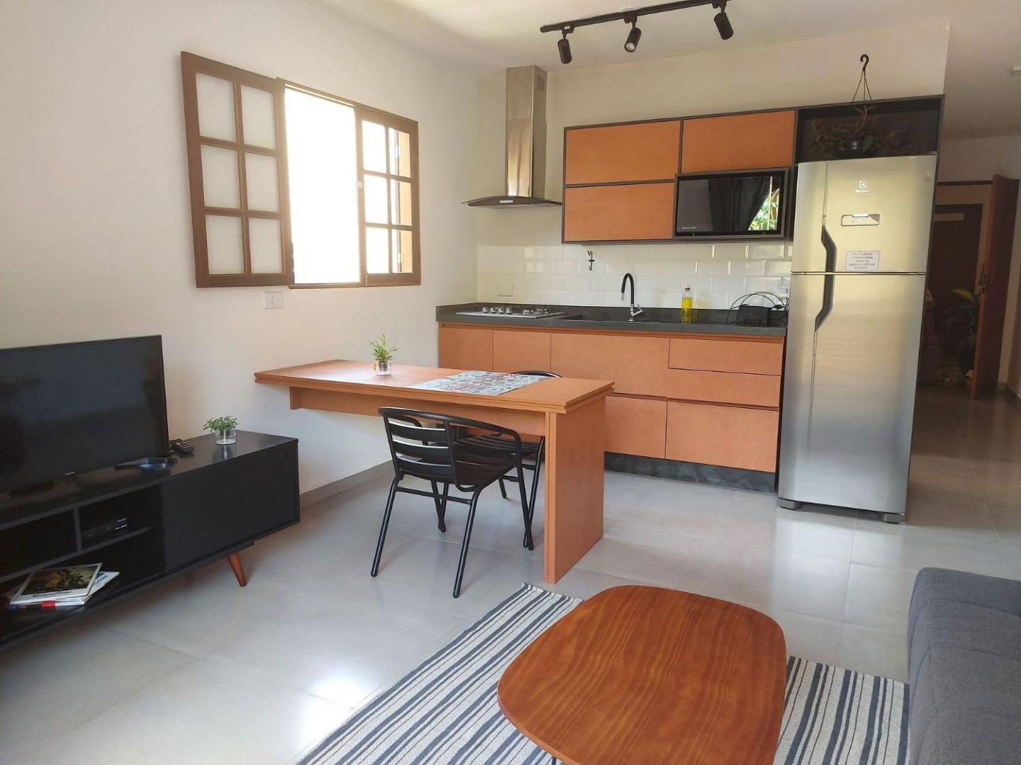 Foto 6: Cotia - Novo Flat com Piscina, 50mts da praia, churrasqueira privativa, ar con, wi-fi, netflix, garagem