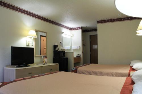 Foto 10: Super 8 by Wyndham San Antonio/Fiesta