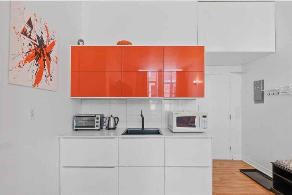 Kuva 6: INITIAL - ORANGE studio - Centre-Ville de Québec