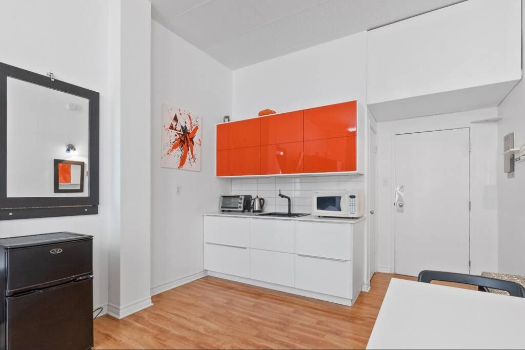 Kuva 7: INITIAL - ORANGE studio - Centre-Ville de Québec