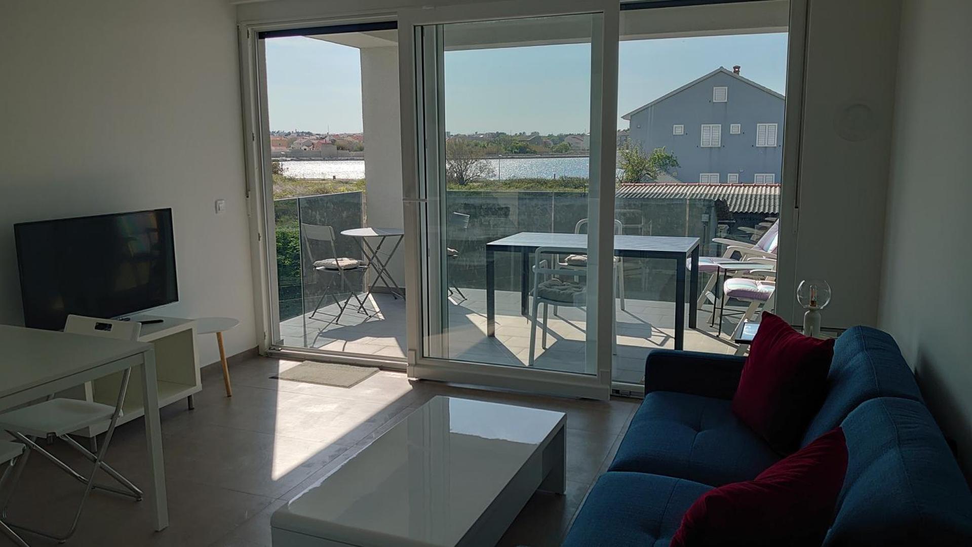 Φωτογραφία 6: Sunset view at the sandy beach - Nin luxury apartment