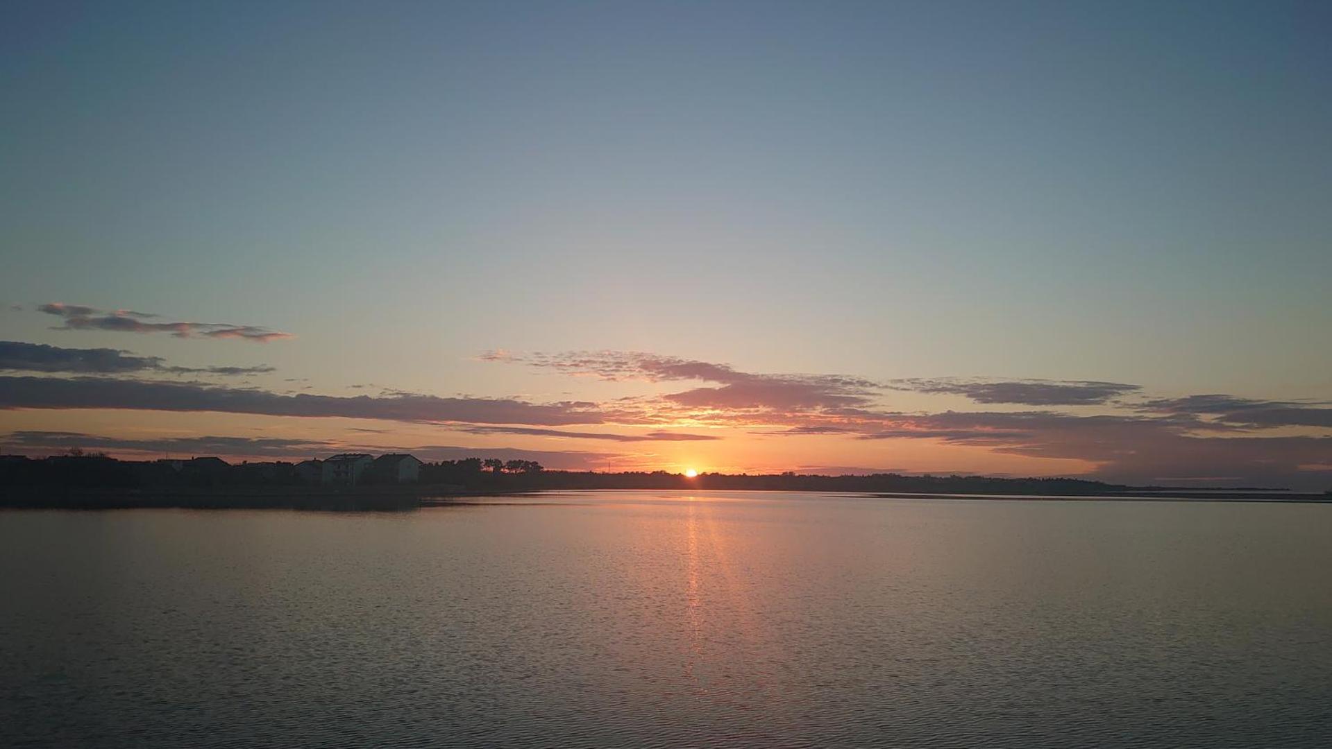 Φωτογραφία 3: Sunset view at the sandy beach - Nin luxury apartment