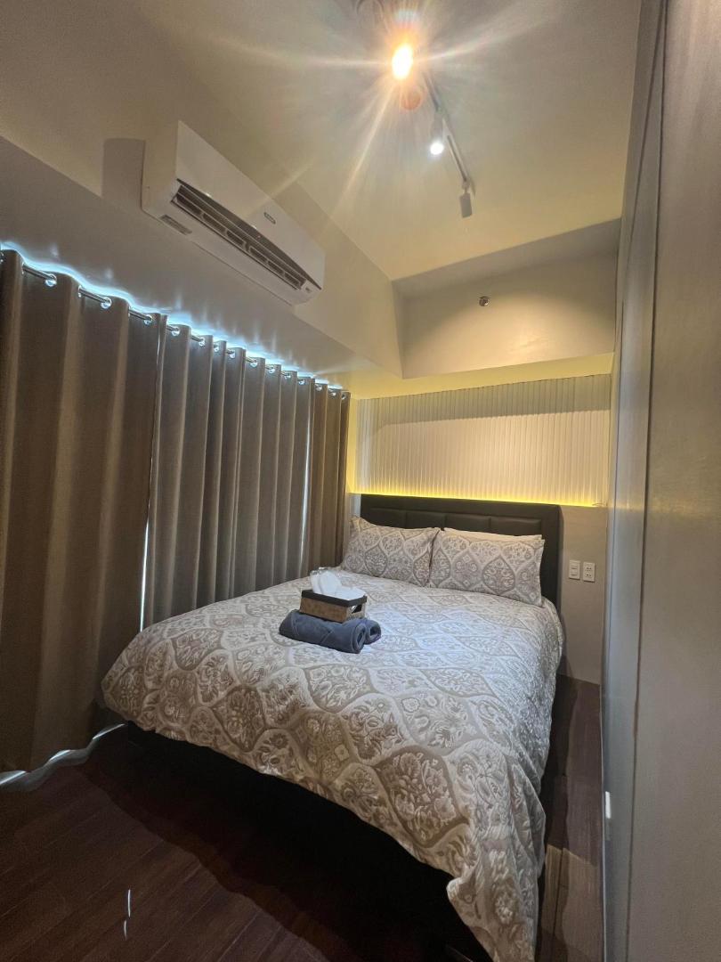 Kuva 5: E & T Homecations 2 Bedroom Apartment at SMDC Air Residences