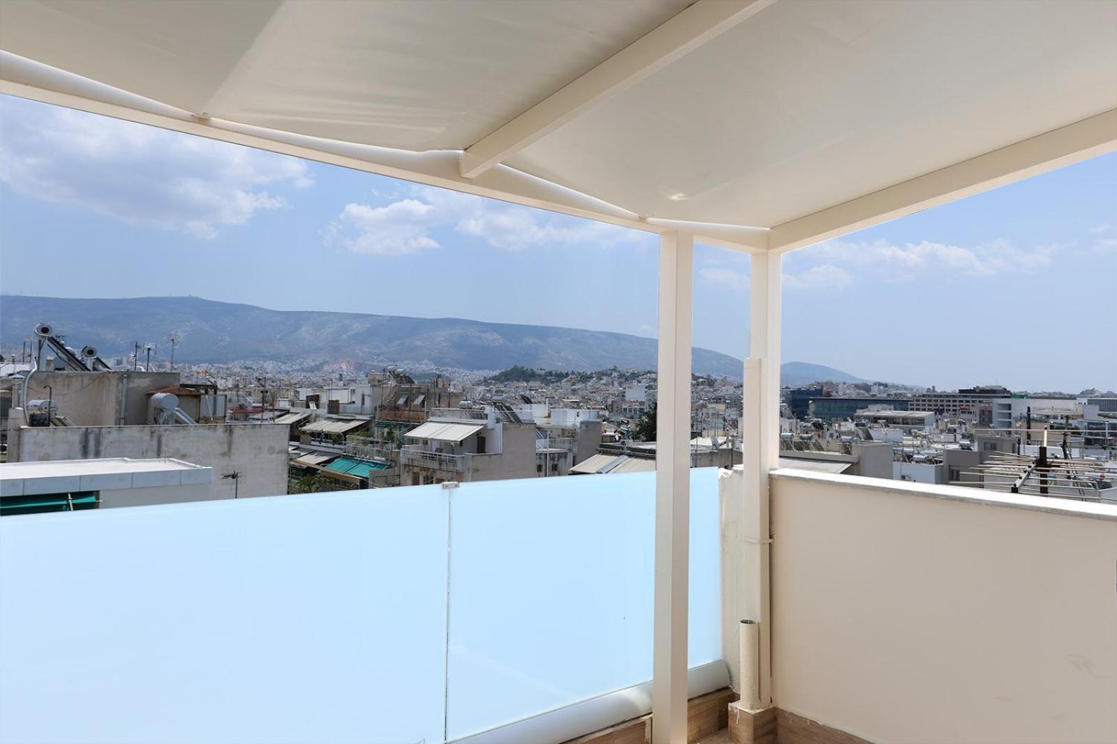 Fotografie 2: LIV - View and the City Studio in Athens