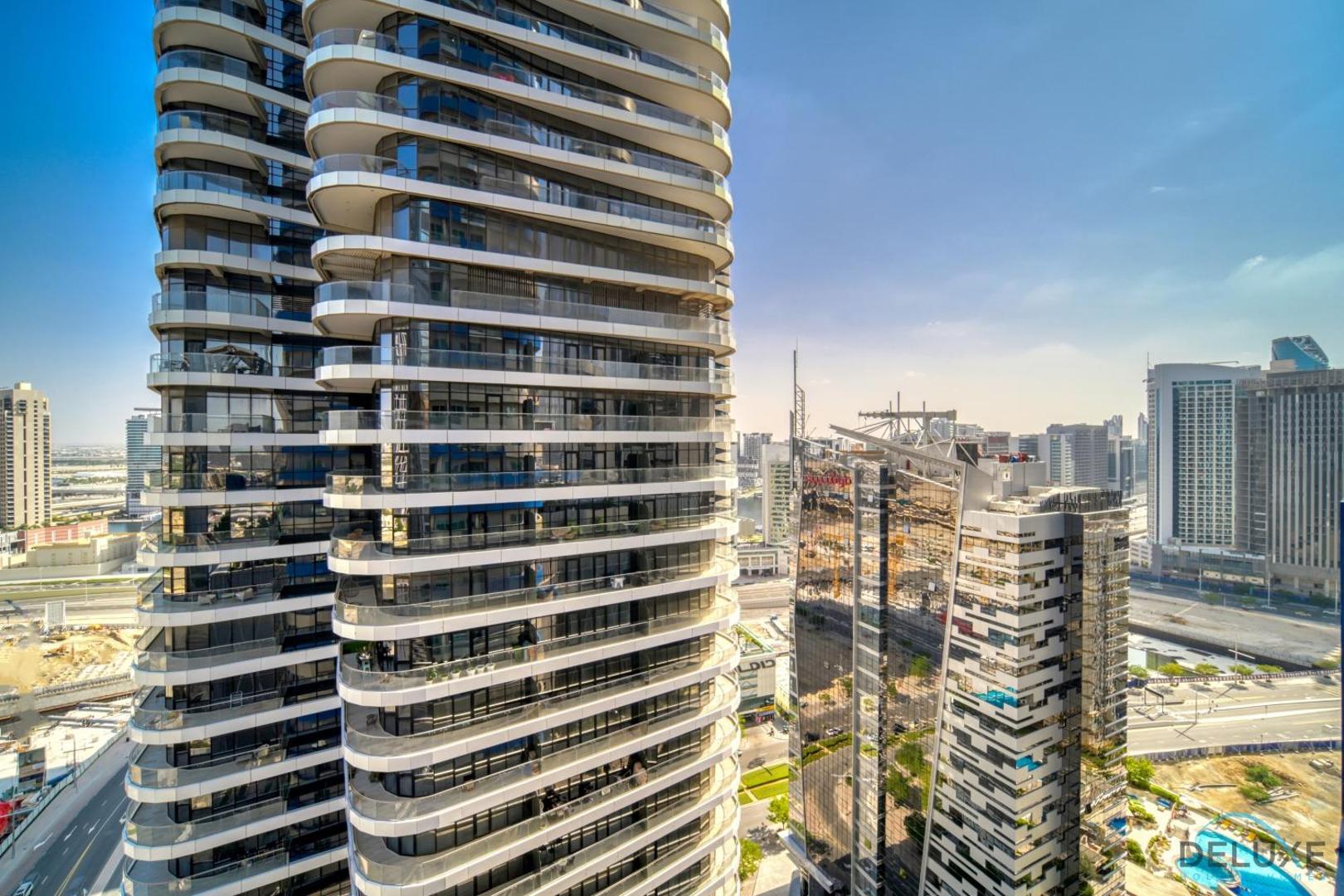 Foto 7: Chic 1BR at The Signature Downtown Dubai by Deluxe Holiday Homes