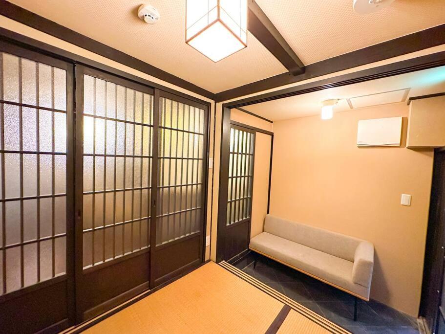 Zdjęcie 3: 祇園の路地奥の京町家