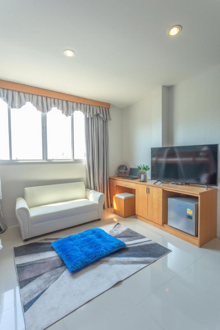 Fotografia 3: 太阳花酒店三人间带电梯